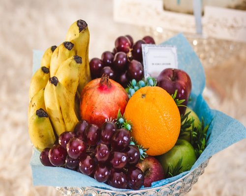 Fresh tropical fruits arranged in a bowl