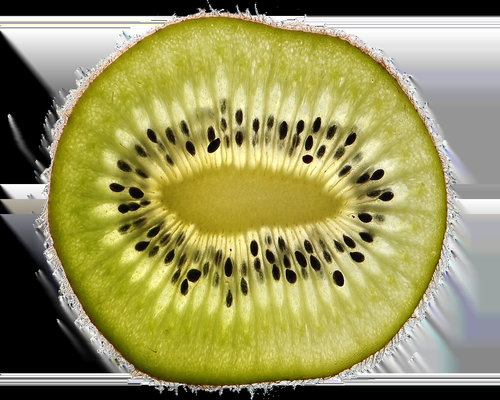 Ripe avocado cut in half showing the stone